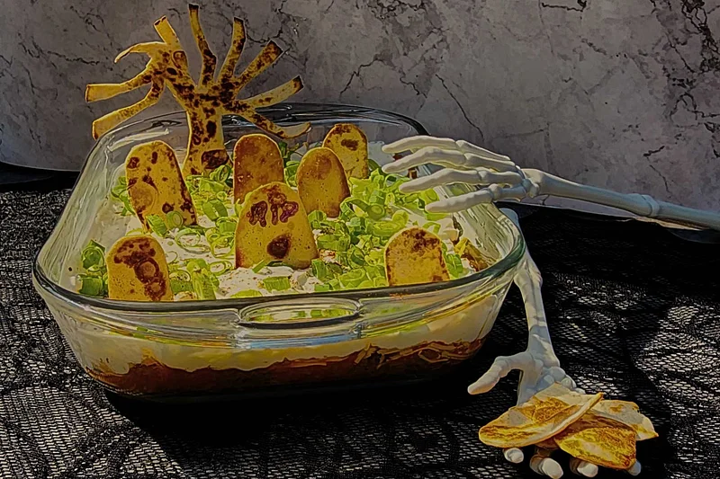 Mole Olé Graveyard Layered Bean Dip
